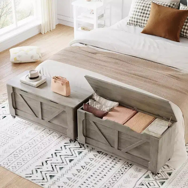 Banc de rangement gris avec roues et charnières de sécurité